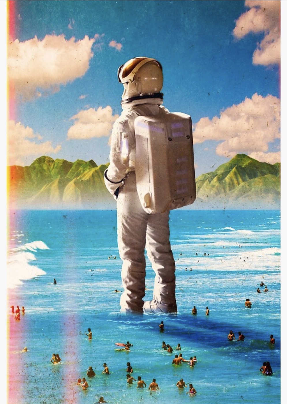 A giant astronaut standing in the ocean.